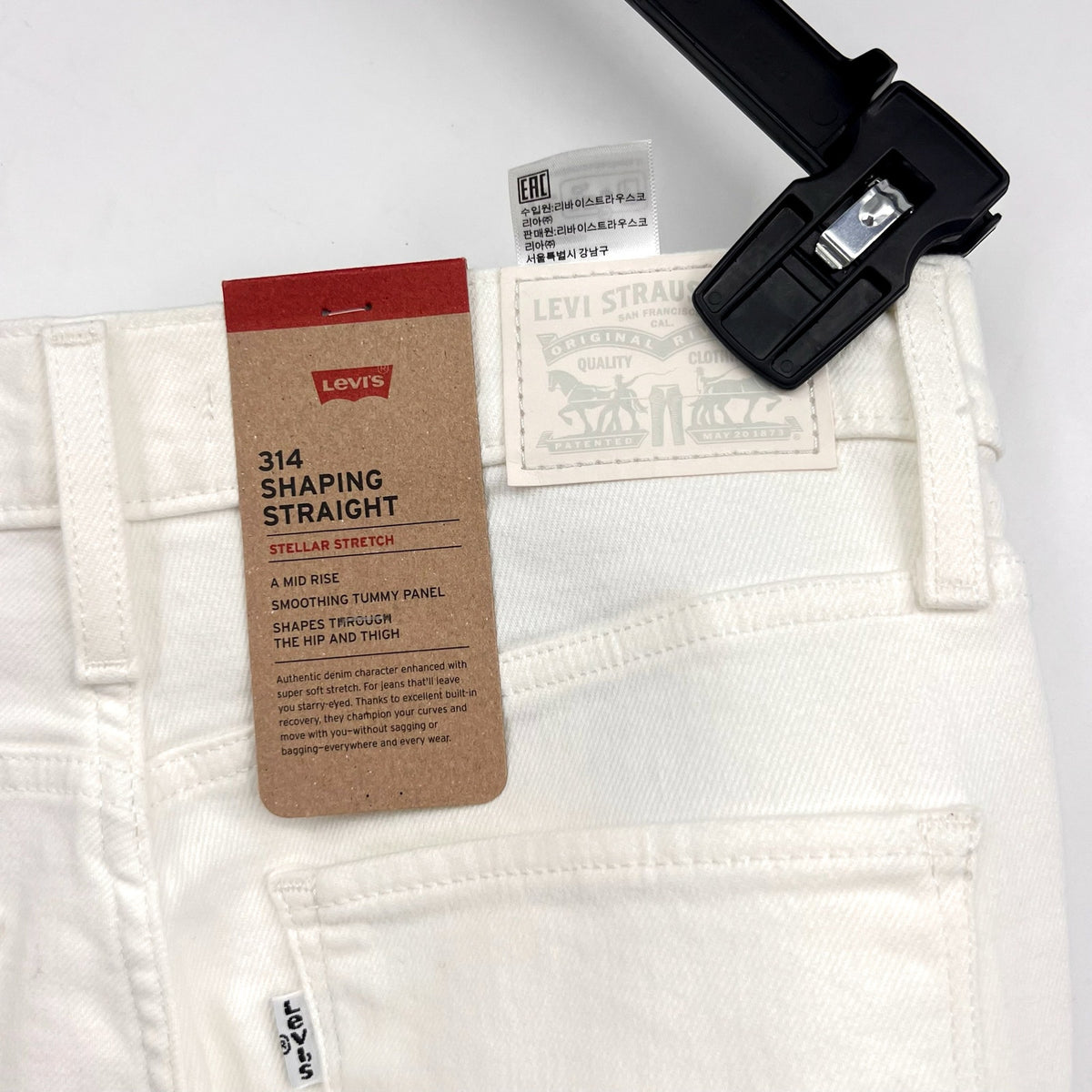 LEVI'S Women's 314 Shaping Straight Jeans 27x32 US 4 Clean White Stretch NWT