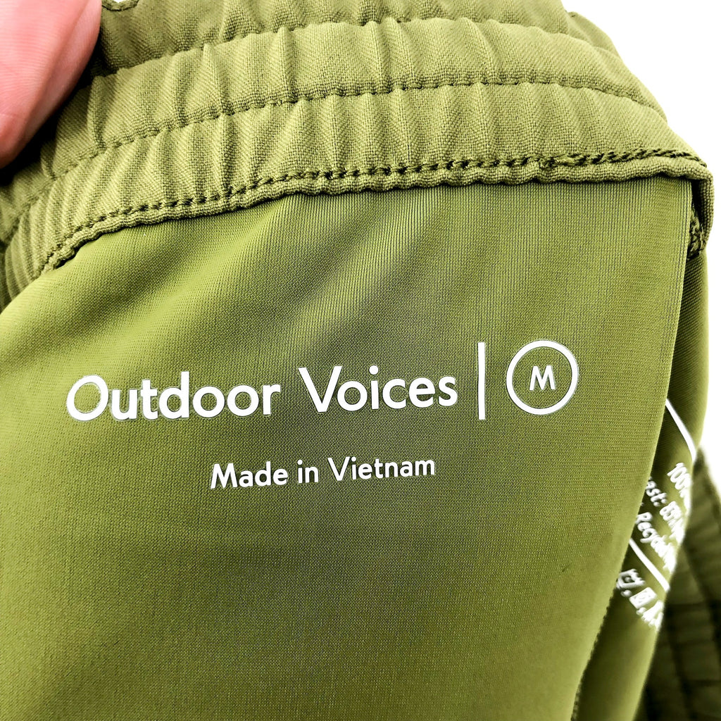 OUTDOOR VOICES Mens High Stride 7" Shorts Medium Green Athletic Pockets NWT